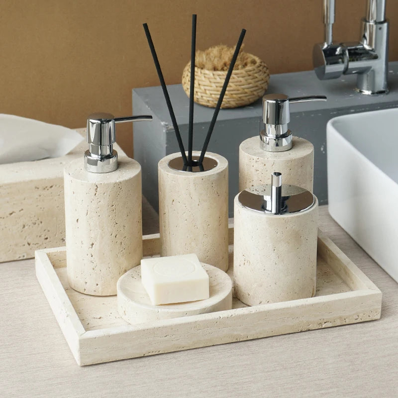 Natural Beige Marble Bathroom Accessory Set including soap dish, reed diffuser, soap dispenser, cotton swabs can, cup, and tray