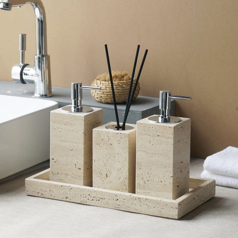 Natural Beige Marble Bathroom Accessory Set including soap dish, reed diffuser, soap dispenser, cotton swabs can, cup, and tray