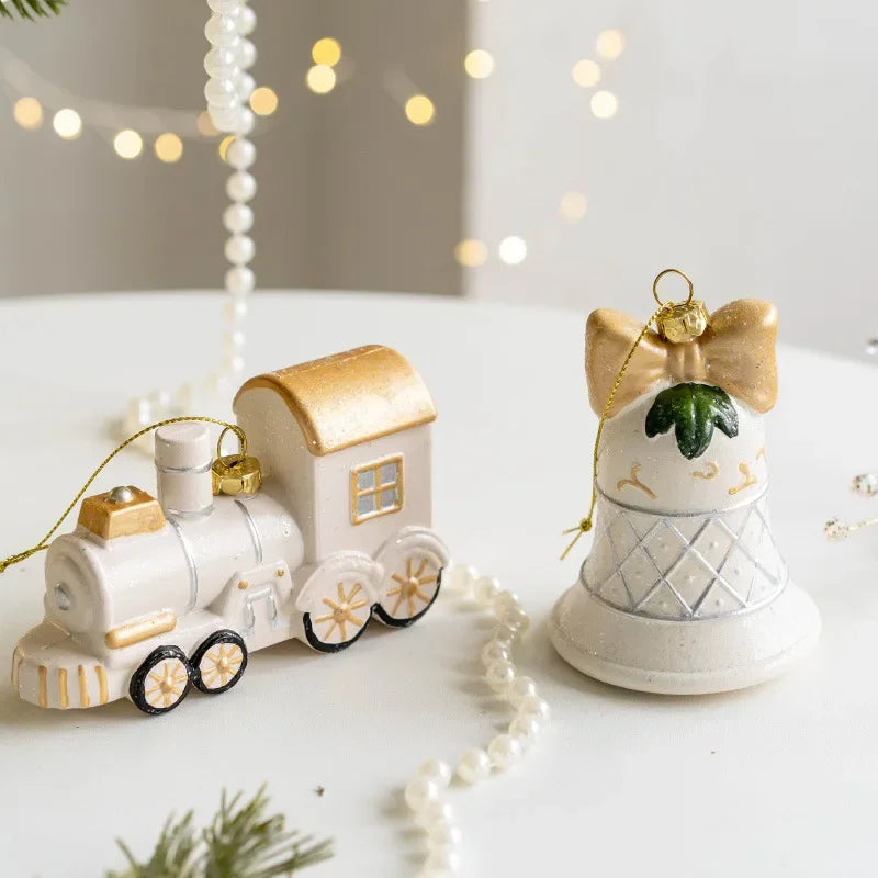 Nordic Christmas Charm Pendants in white and gold tones, featuring 10 designs such as a chimney house, polar bear, and soldier on horseback. Perfect for adding a rustic touch to festive holiday decor.