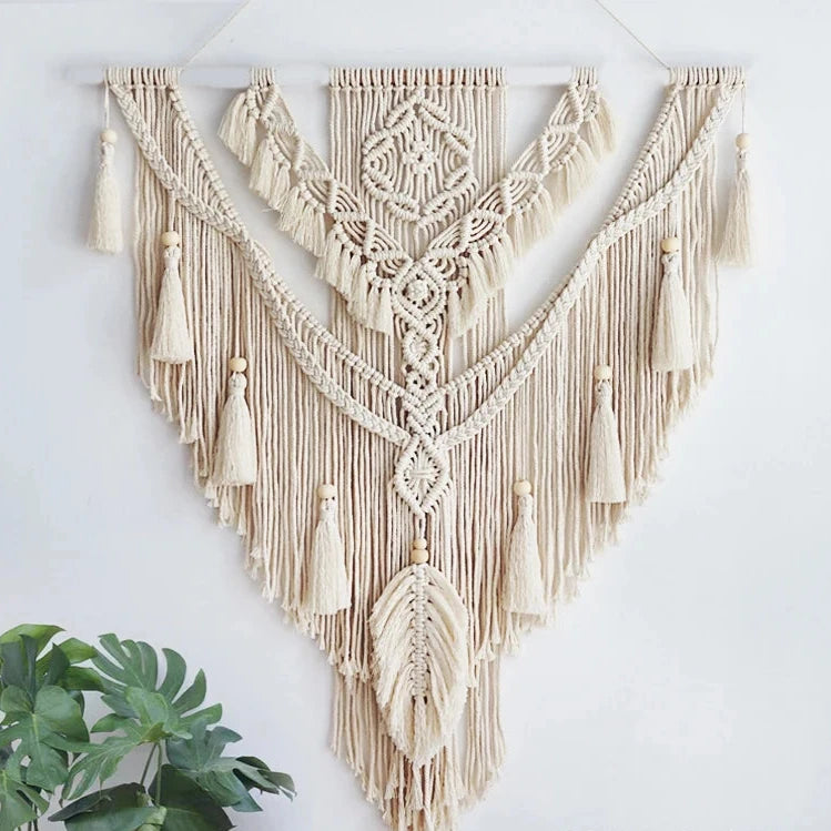 Hand-woven macrame wall hanging in Nordic boho style, featuring tassels and 100% cotton material. Perfect for adding a cozy and natural touch to any space.