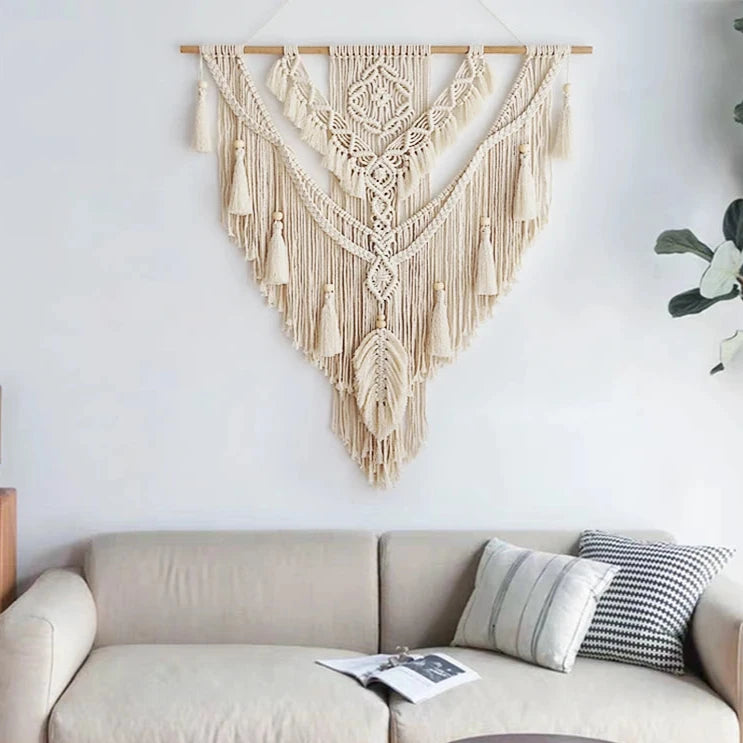 Hand-woven macrame wall hanging in Nordic boho style, featuring tassels and 100% cotton material. Perfect for adding a cozy and natural touch to any space.