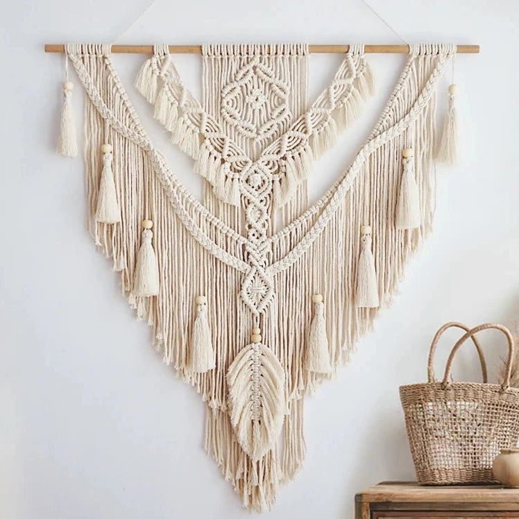 Hand-woven macrame wall hanging in Nordic boho style, featuring tassels and 100% cotton material. Perfect for adding a cozy and natural touch to any space.