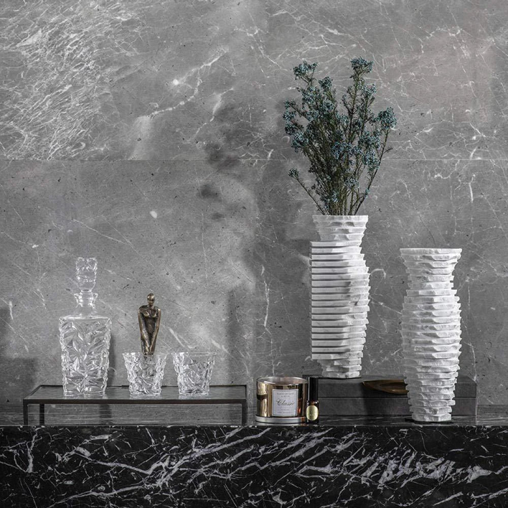 A stylish Nordic Charm Natural Marble Vase, featuring a sleek design with natural marble patterns