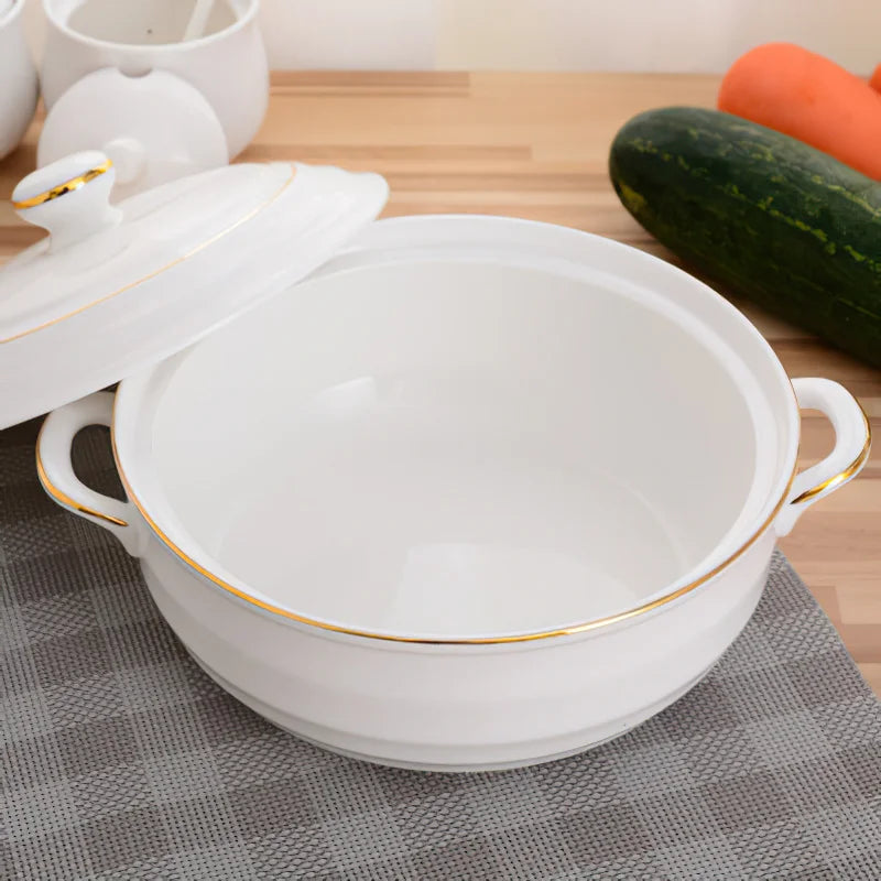 Nordic white ceramic soup pot with a round shape and lid, perfect for serving soups and stews.