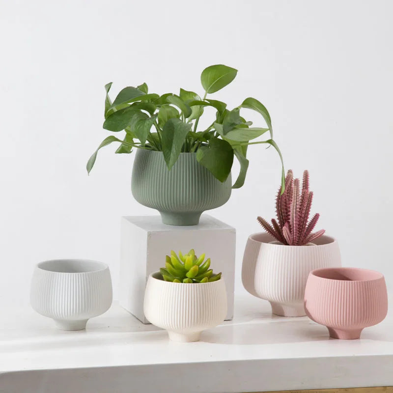 Pastel striped ceramic vases for home décor – minimalist pots for potted plants or flowers, perfect for desk or room decoration.

