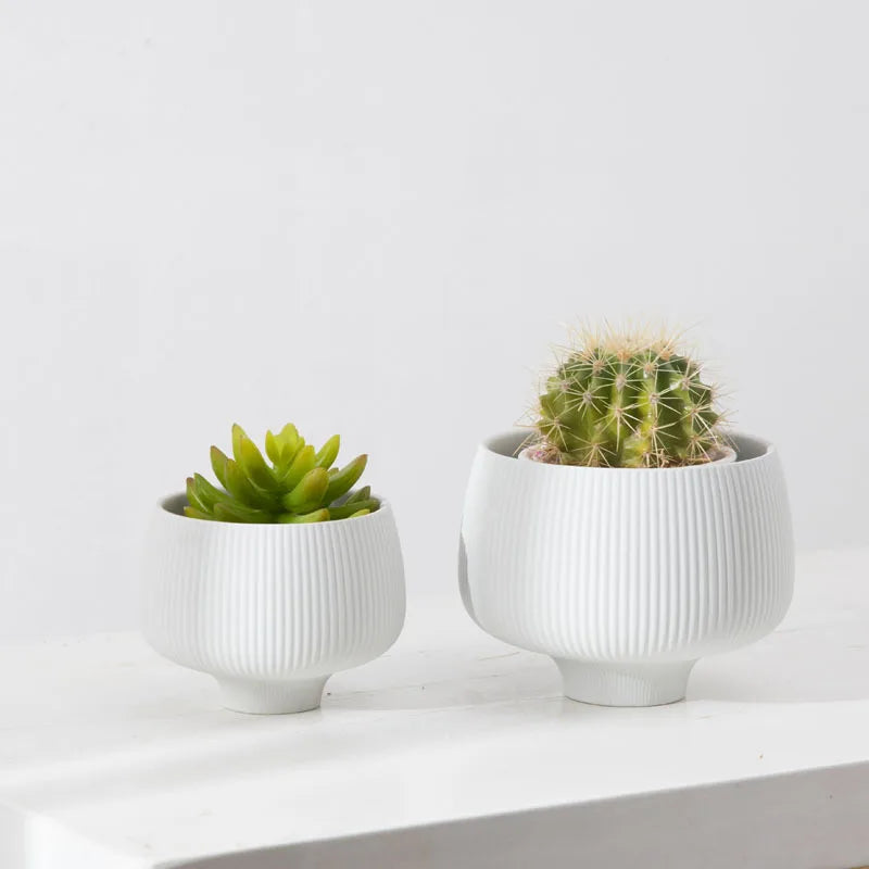 Pastel striped ceramic vases for home décor – minimalist pots for potted plants or flowers, perfect for desk or room decoration.

