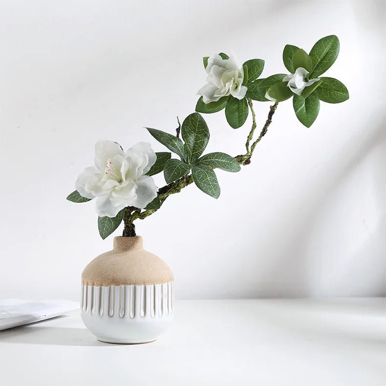 A creative ceramic vase showcasing an elegant and artistic arrangement perfect for home decor.