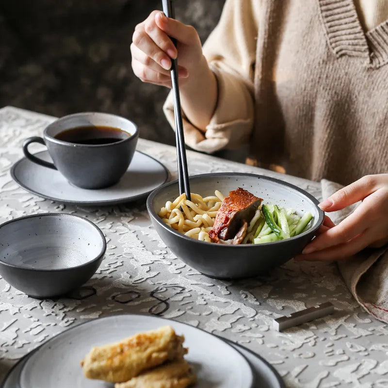 Retro Design Dinnerware Set featuring vintage-inspired patterns in earthy tones, ideal for adding a nostalgic touch to your dining table.