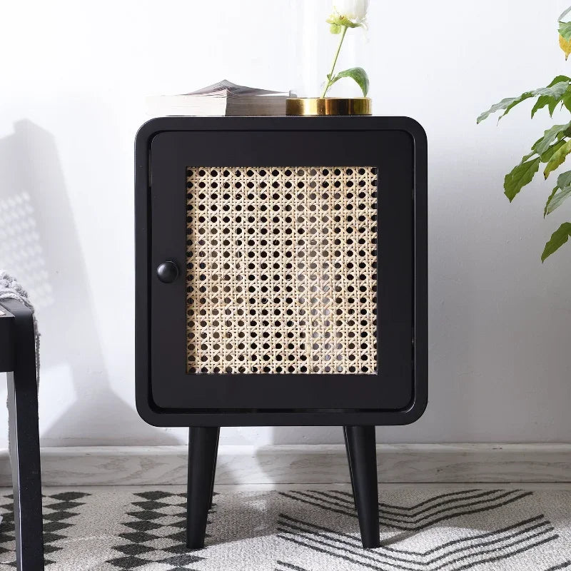 Retro-inspired mini storage cabinet with natural rattan front and sleek legs, perfect for adding style and storage to any room in your home.