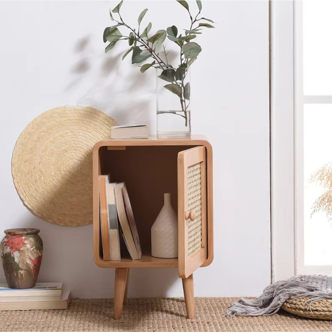 Retro-inspired mini storage cabinet with natural rattan front and sleek legs, perfect for adding style and storage to any room in your home.