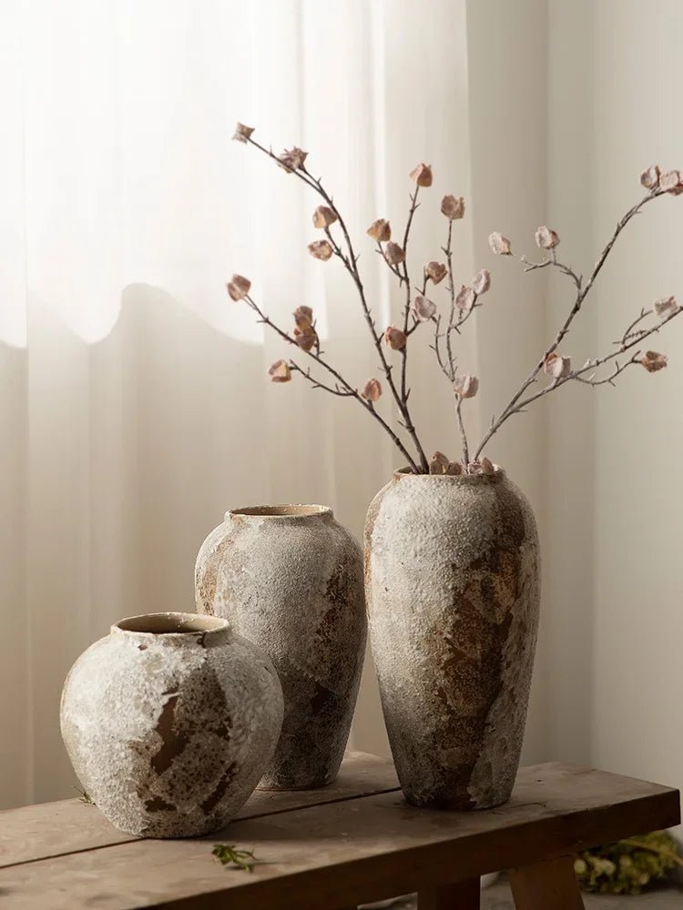 Rustic Hydroponic Ceramic Vase with earthy brown tones and a mottled retro design, perfect for adding elegance and charm to any living room decor.