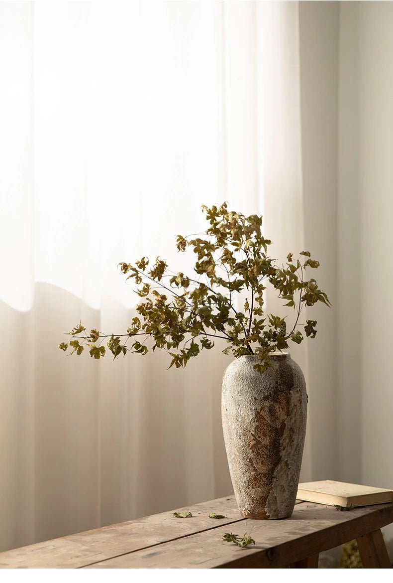 Rustic Hydroponic Ceramic Vase with earthy brown tones and a mottled retro design, perfect for adding elegance and charm to any living room decor.