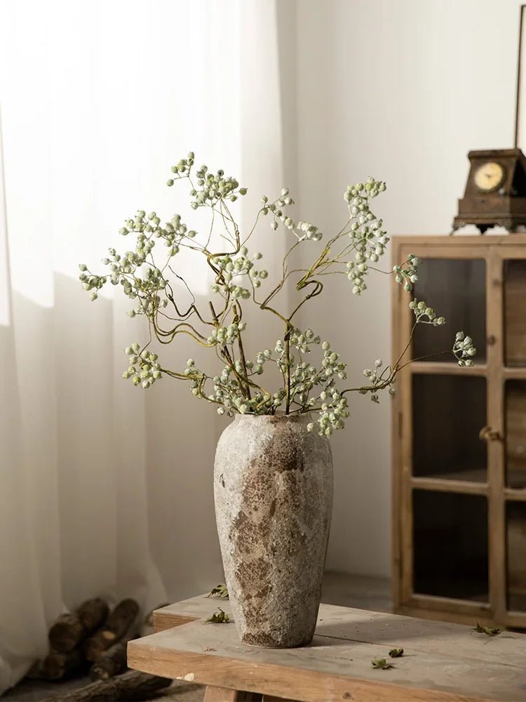 Rustic Hydroponic Ceramic Vase with earthy brown tones and a mottled retro design, perfect for adding elegance and charm to any living room decor.