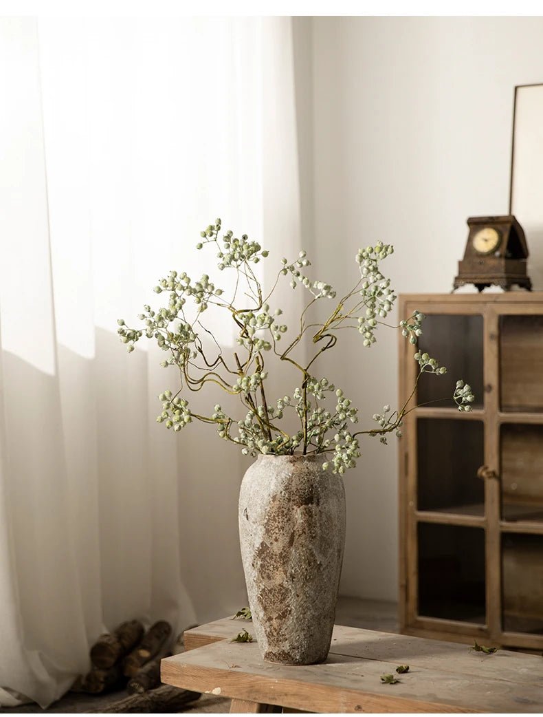 Rustic Hydroponic Ceramic Vase with earthy brown tones and a mottled retro design, perfect for adding elegance and charm to any living room decor.