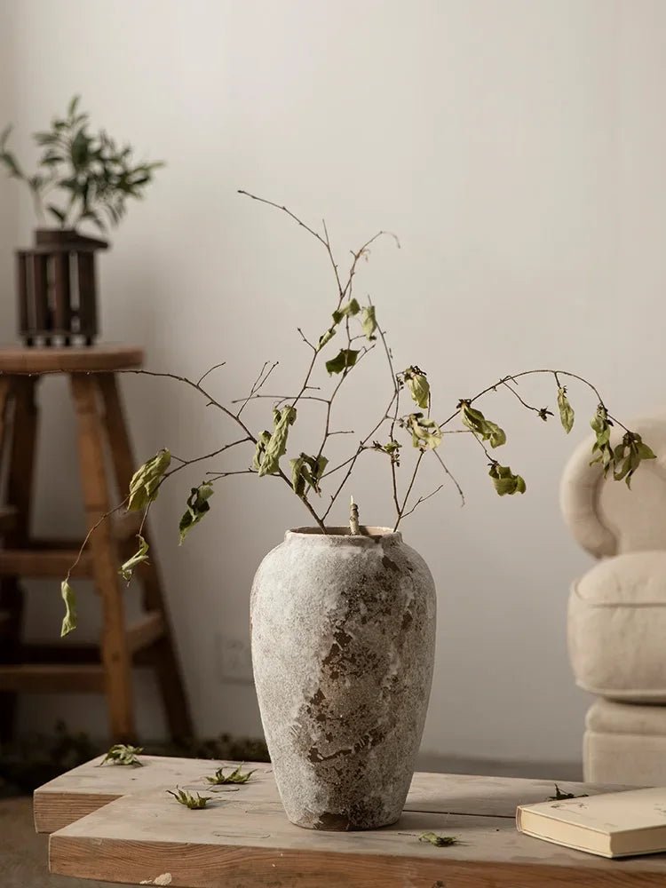 Rustic Hydroponic Ceramic Vase with earthy brown tones and a mottled retro design, perfect for adding elegance and charm to any living room decor.