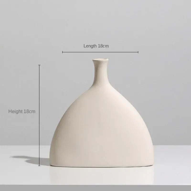 A simple charm ceramic vase with a minimalist design, perfect for adding elegance to any home decor.