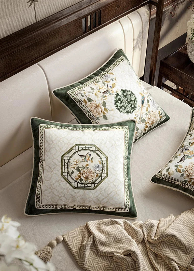 Soft velvet cushion cover with delicate oriental flower and bird prints. Timeless design in neutral tones, perfect for adding a subtle, stylish touch to any space.