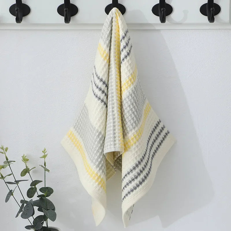 Timeless Soft Touch Cotton Towel in neutral tones, crafted from soft and absorbent cotton, perfect for kitchens.