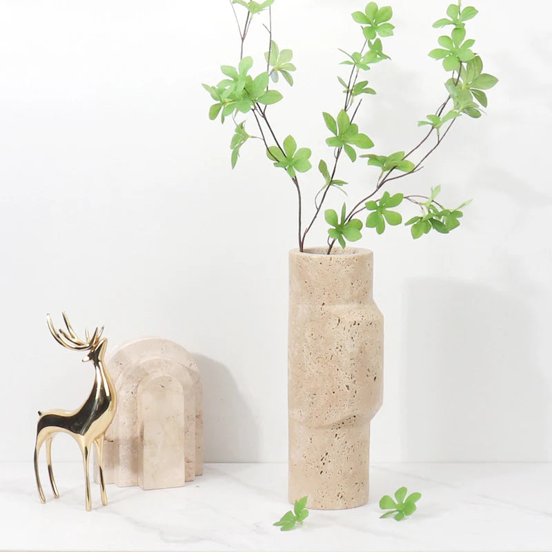 Contemporary travertine marble vase with beige tones, blending rustic simplicity and elegance, perfect for home decor.