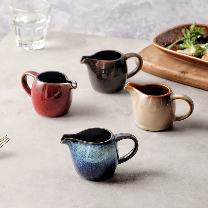 Asian style ceramic mini gravy boat in red, mushroom beige, blue, and dark taupe – perfect for milk or sauces.