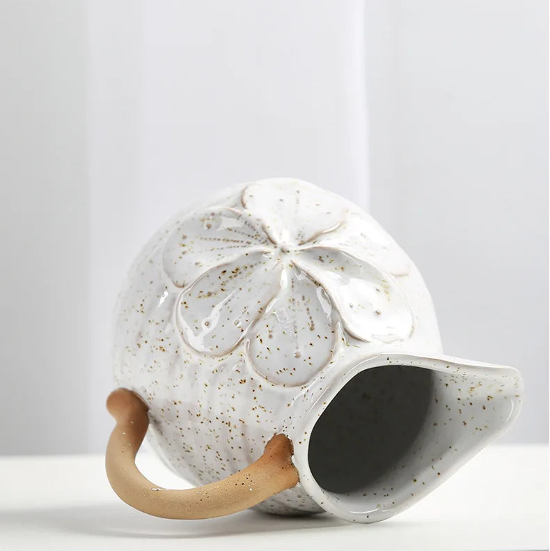 A Vintage Charm Ceramic Vase with handles, displaying intricate vintage designs perfect for adding an elegant touch to home decor.