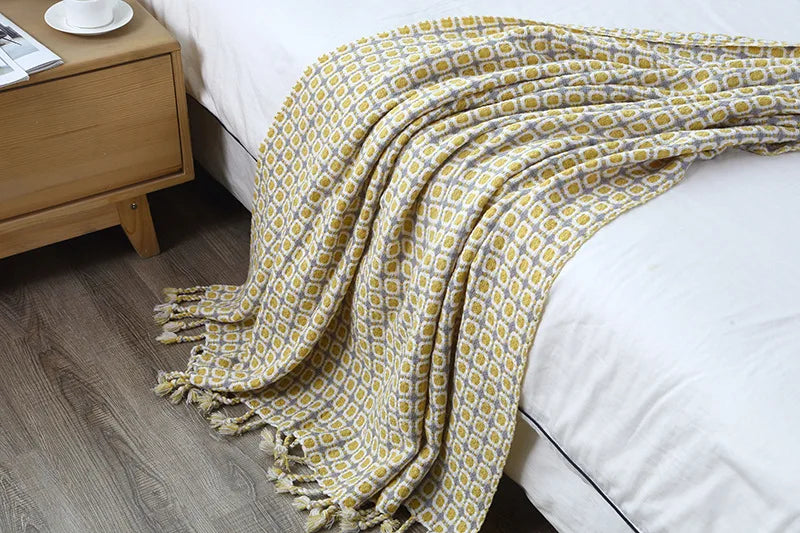 Vintage plaid bed blanket with modern round patterns, perfect for adding warmth and style to your home decor.