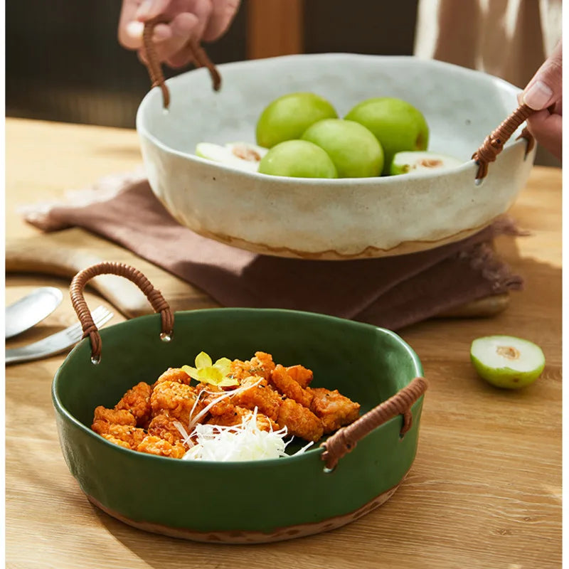 Vintage clay serving bowl with woven handles, perfect for meals or as a decorative centrepiece.