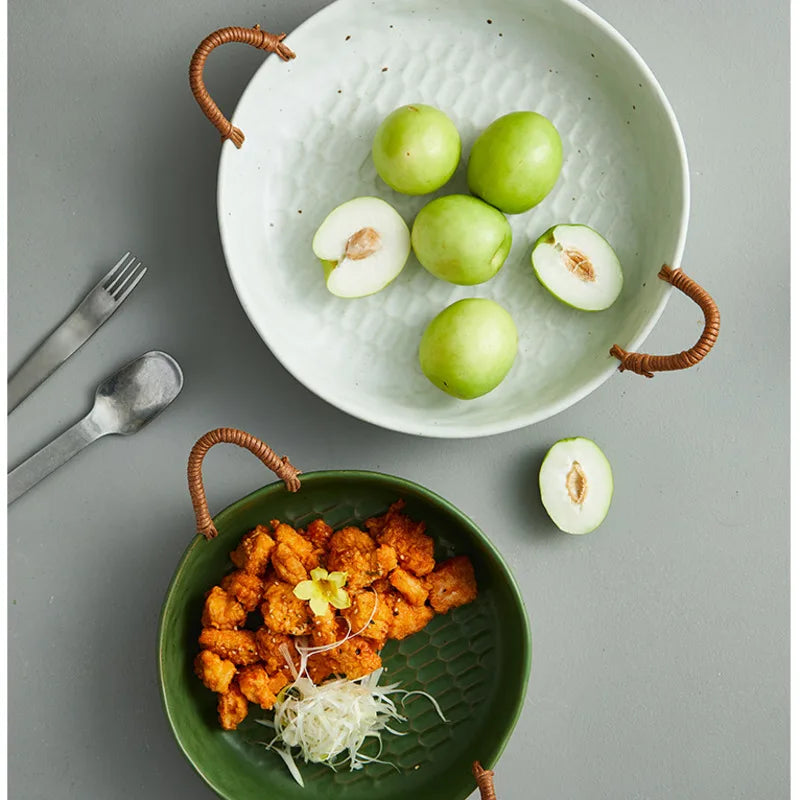 Vintage clay serving bowl with woven handles, perfect for meals or as a decorative centrepiece.