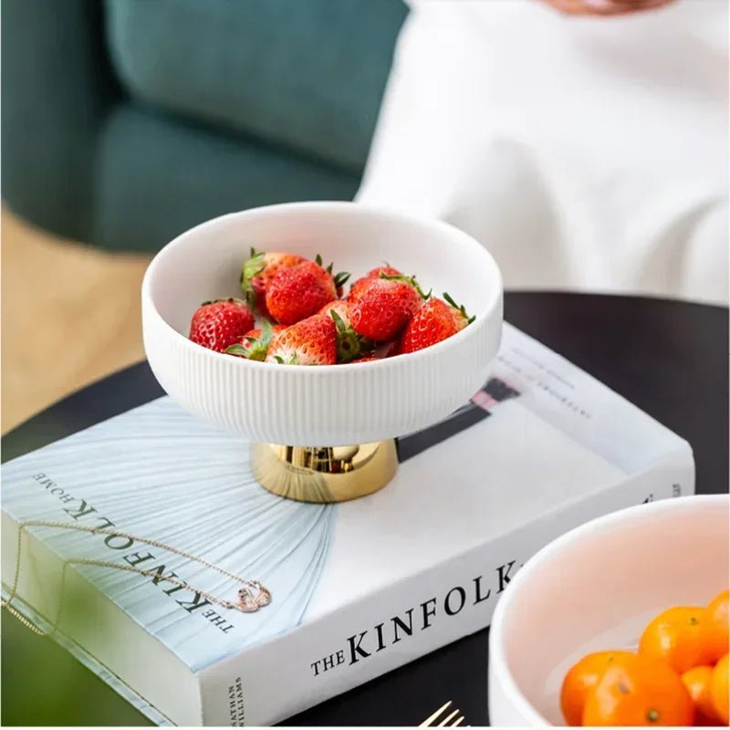 ceramic fruit bowls filled with strawberries