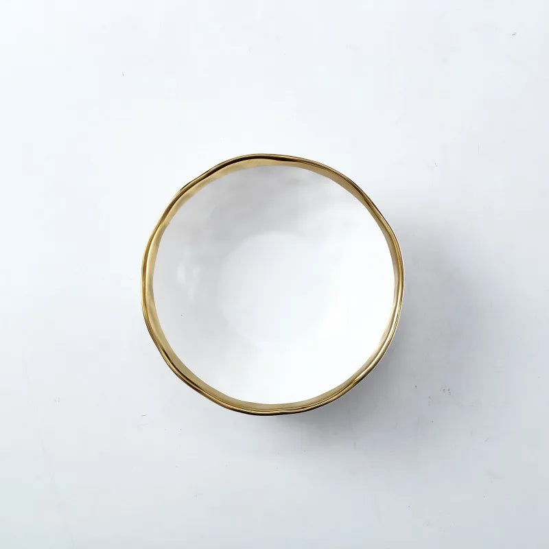 Elegant white serving plate and bowl with a gold rim, perfect for upscale dining and special occasions.