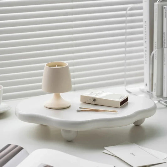 White minimalist tray with irregular shape and dot legs. Ideal for organising or as a modern centrepiece, bringing style and function to any space.