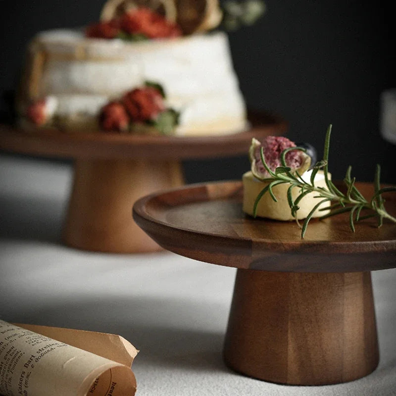 Wood cake stand with smooth edges, perfect for displaying desserts and pastries.