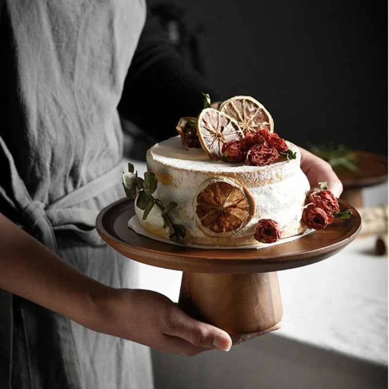 Wood cake stand with smooth edges, perfect for displaying desserts and pastries.